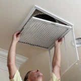 Image shows the changing of air filters.
